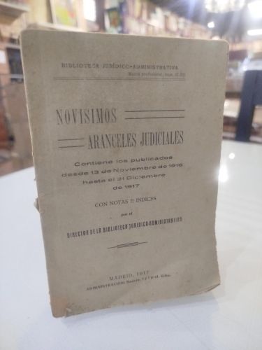 Portada del libro de Novísimos aranceles judiciales. Contiene los publicados desde 13 de Noviembre de 1916 hasta el 31 de...