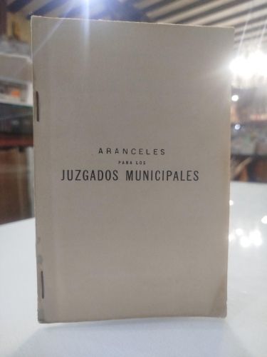 Portada del libro de Aranceles para los juzgados municipales.